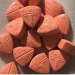 buy orange tesla ecsatsy